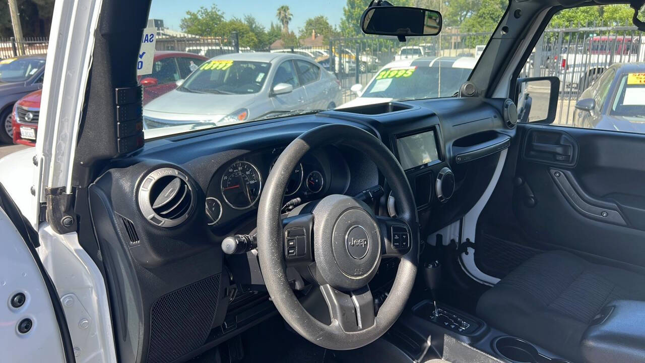 2012 Jeep Wrangler Unlimited for sale at Auto Plaza in Fresno, CA