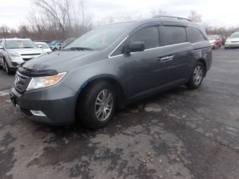 2011 Honda Odyssey for sale at Pool Auto Sales Inc in Spencerport NY