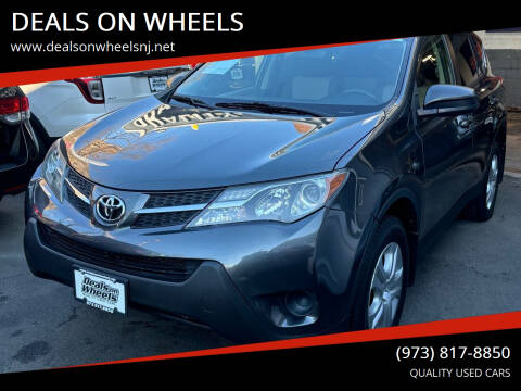 2013 Toyota RAV4 for sale at DEALS ON WHEELS in Newark NJ