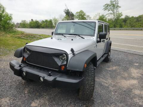 2012 Jeep Wrangler Unlimited for sale at Mackeys Autobarn in Bedford PA