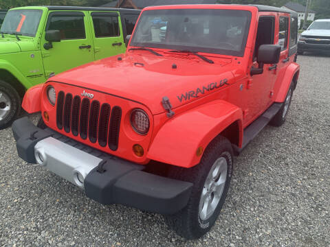 2013 Jeep Wrangler Unlimited for sale at Leonard Enterprise Used Cars in Orion Township MI