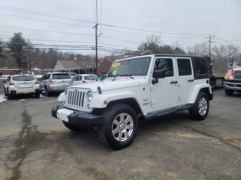 2016 Jeep Wrangler Unlimited for sale at Hometown Automotive Service & Sales in Holliston MA