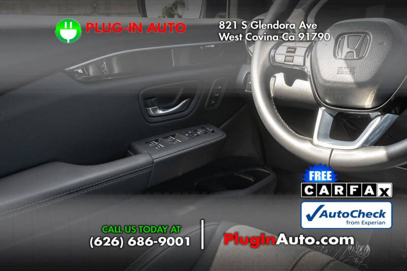 2023 Honda Pilot EX-L w/Rear Captain's Chairs