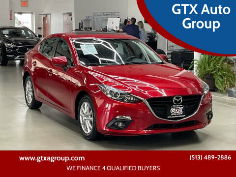 2015 Mazda MAZDA3 for sale at GTX Auto Group in West Chester OH