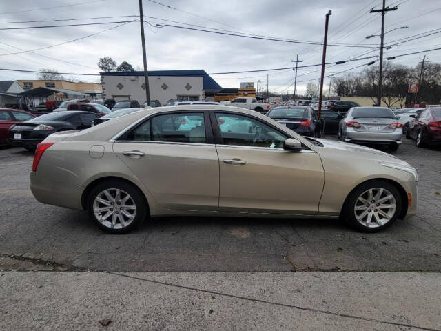 2014 Cadillac CTS for sale at DAGO'S AUTO SALES LLC in Dalton, GA