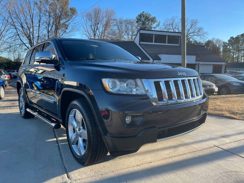 2011 Jeep Grand Cherokee for sale at Alpha Car Land LLC in Snellville GA