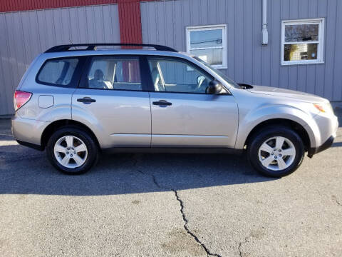 2010 Subaru Forester for sale at Howe's Auto Sales in Lowell MA