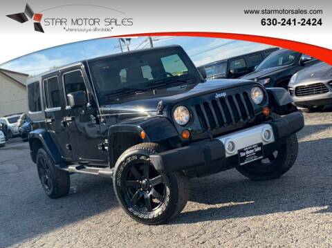 2012 Jeep Wrangler Unlimited for sale at Star Motor Sales in Downers Grove IL
