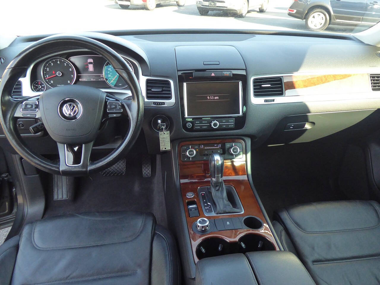 2014 Volkswagen Touareg for sale at Lakeshore Autos in Holland, MI