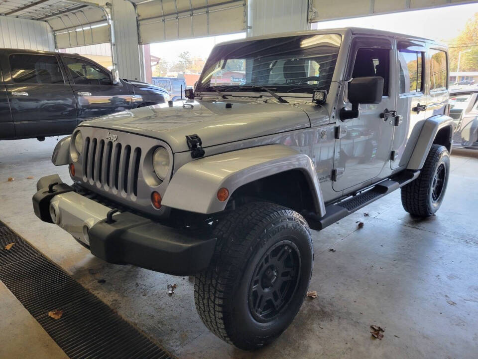 2013 Jeep Wrangler Unlimited for sale at COOPER AUTO SALES in ONEIDA, TN