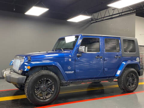 2009 Jeep Wrangler Unlimited for sale at AutoNet of Dallas in Dallas TX