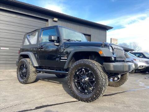 2016 Jeep Wrangler for sale at HUFF AUTO GROUP in Jackson MI