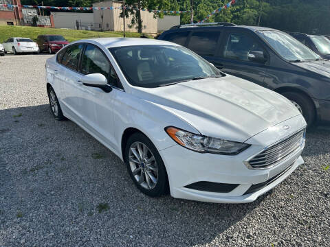 2017 Ford Fusion for sale at SAVORS AUTO CONNECTION LLC in East Liverpool OH