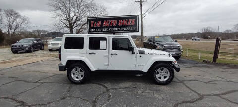 2012 Jeep Wrangler Unlimited for sale at T & G Auto Sales in Florence AL