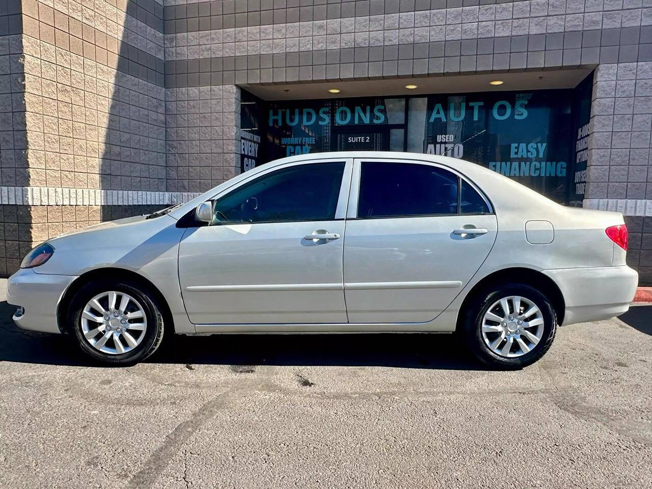 2003 Toyota Corolla for sale at HUDSONS AUTOS in Gilbert, AZ