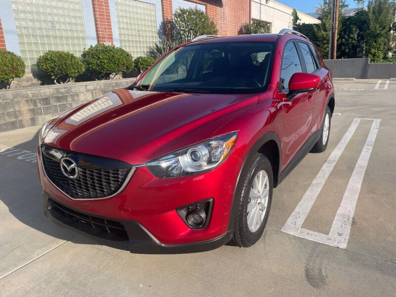 2014 Mazda CX-5 for sale at LOW PRICE AUTO SALES in Van Nuys CA