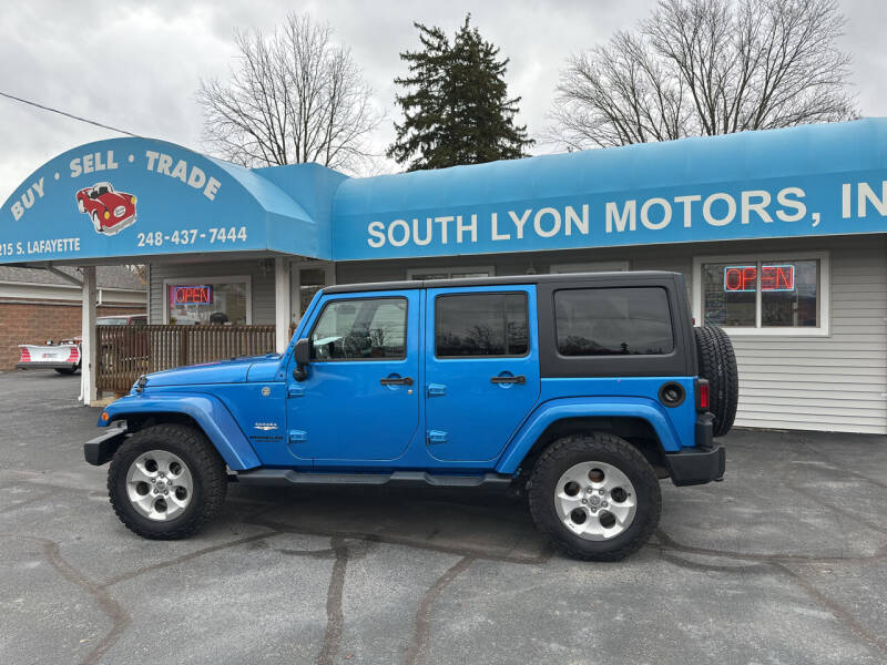 2014 Jeep Wrangler Unlimited for sale at South Lyon Motors INC in South Lyon MI