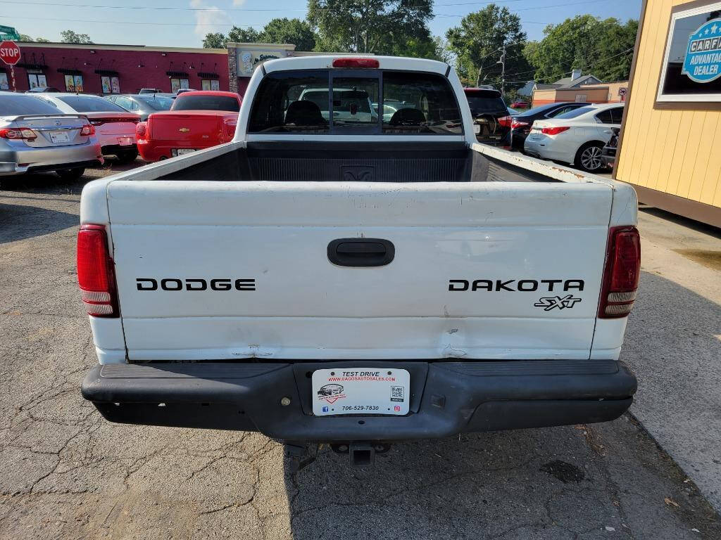 2004 Dodge Dakota for sale at DAGO'S AUTO SALES LLC in Dalton, GA