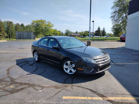 2012 Ford Fusion for sale at Lasco of Grand Blanc in Grand Blanc MI