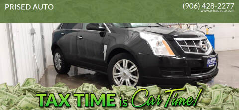 2012 Cadillac SRX for sale at PRISED AUTO in Gladstone MI