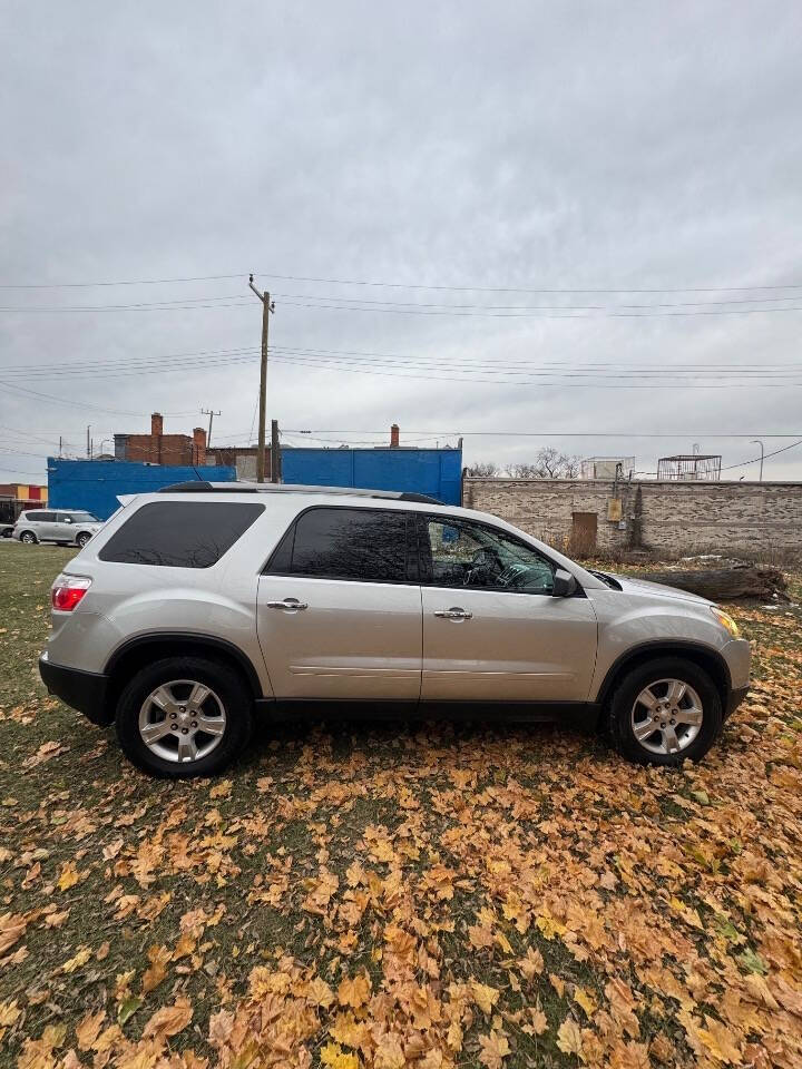 2011 GMC Acadia for sale at H & H AUTO GROUP in Detroit, MI