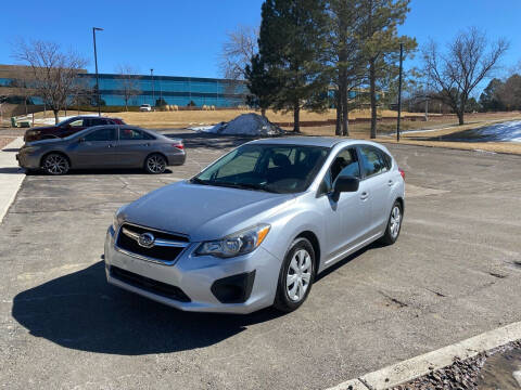 2012 Subaru Impreza for sale at QUEST MOTORS in Englewood CO