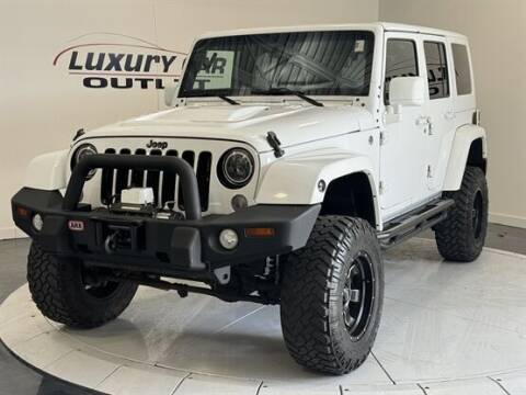 2015 Jeep Wrangler Unlimited for sale at Luxury Car Outlet in West Chicago IL