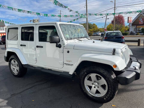 2011 Jeep Wrangler Unlimited for sale at Auto Sales Center Inc in Holyoke MA