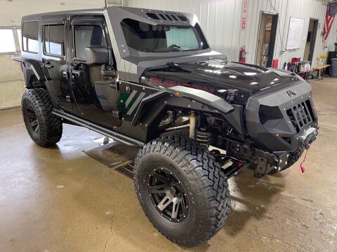 2014 Jeep Wrangler Unlimited for sale at Premier Auto in Sioux Falls SD