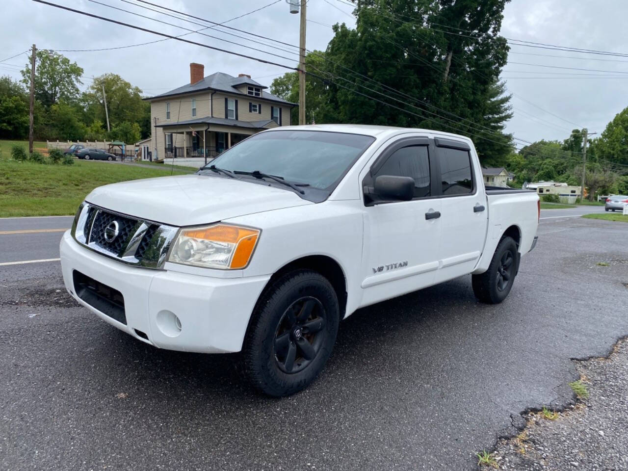 2011 Nissan Titan for sale at Miller's Auto & Sales in Russellville, TN