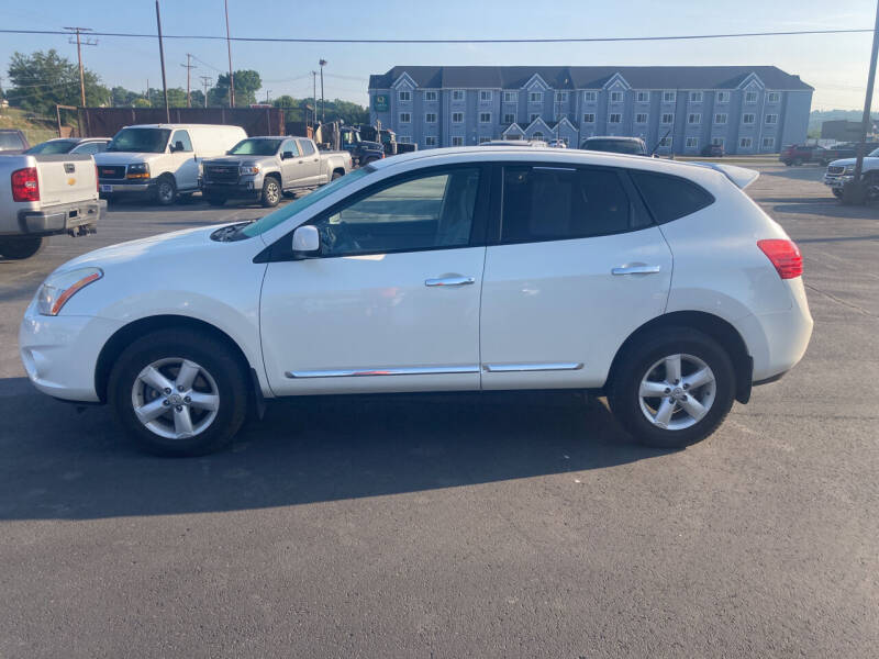 2013 Nissan Rogue for sale at Singer Auto Sales in Caldwell OH