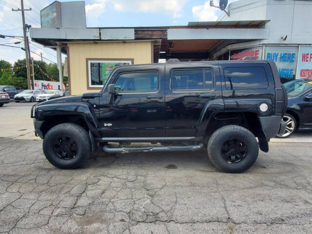 2007 HUMMER H3 for sale at DAGO'S AUTO SALES LLC in Dalton, GA