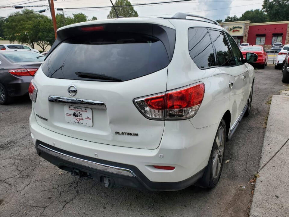 2014 Nissan Pathfinder for sale at DAGO'S AUTO SALES LLC in Dalton, GA