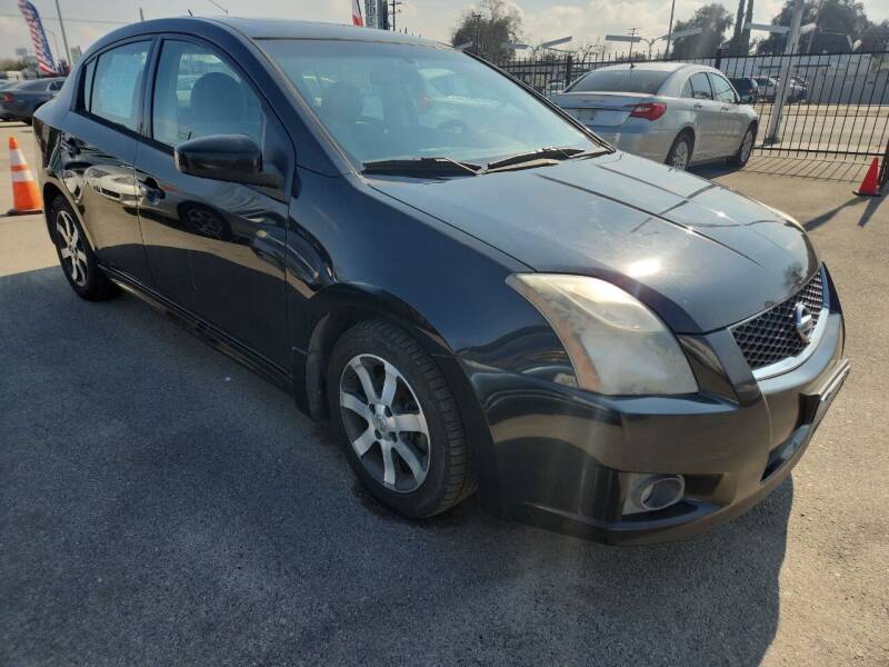 2012 Nissan Sentra for sale at COMMUNITY AUTO in Fresno CA