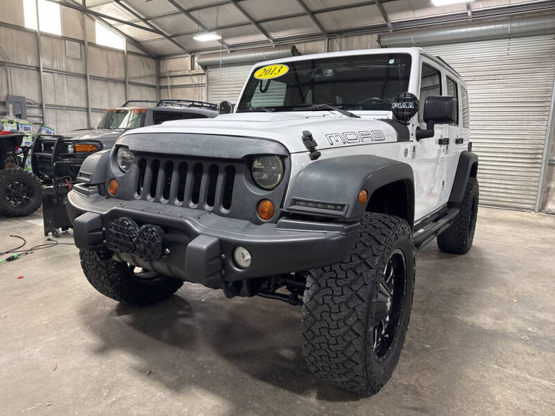 2013 Jeep Wrangler Unlimited for sale at Walker Family Automotive in Albertville AL