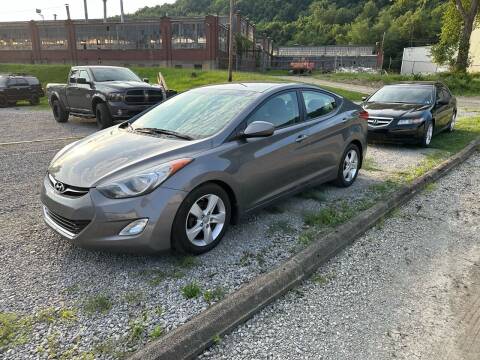 2013 Hyundai Elantra for sale at SAVORS AUTO CONNECTION LLC in East Liverpool OH