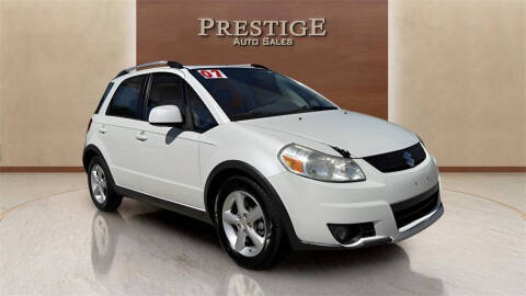 2007 Suzuki SX4 Crossover for sale at CHRIS SPEARS' PRESTIGE AUTO SALES INC in Ocala FL