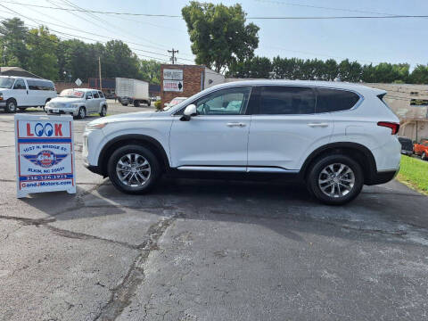 2019 Hyundai Santa Fe for sale at G AND J MOTORS in Elkin NC