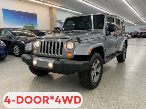 2016 Jeep Wrangler Unlimited for sale at Dixie Motors in Fairfield OH