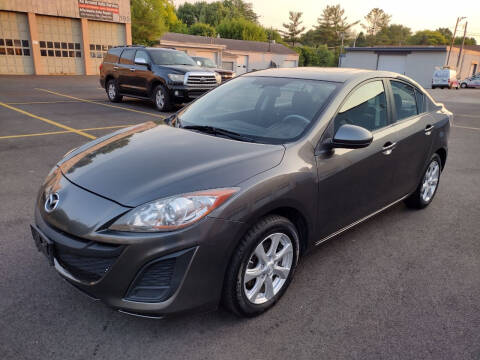 2011 Mazda MAZDA3 for sale at GLOBAL AUTOMOTIVE in Grayslake IL