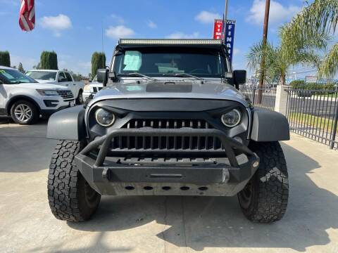 2015 Jeep Wrangler Unlimited for sale at Andes Motors in Bloomington CA