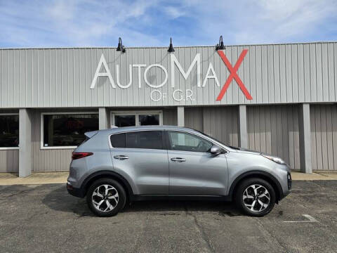2021 Kia Sportage for sale at Auto Max of GR in Comstock Park MI