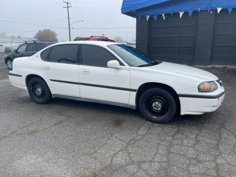 2005 Chevrolet Impala for sale at The Top Autos in Union Gap WA