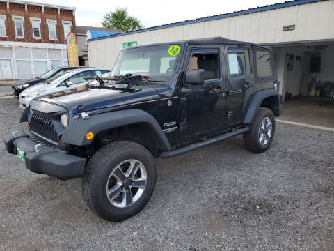 2010 Jeep Wrangler Unlimited for sale at A&R Auto Sales and Services LLC in Connersville IN