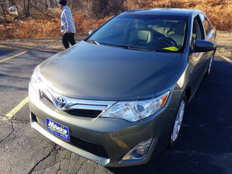 2012 Toyota Camry Hybrid for sale at Howe's Auto Sales in Lowell MA