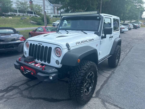 2014 Jeep Wrangler for sale at Premier Automart in Milford MA