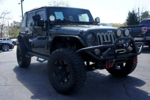 2015 Jeep Wrangler Unlimited for sale at CU Carfinders in Norcross GA