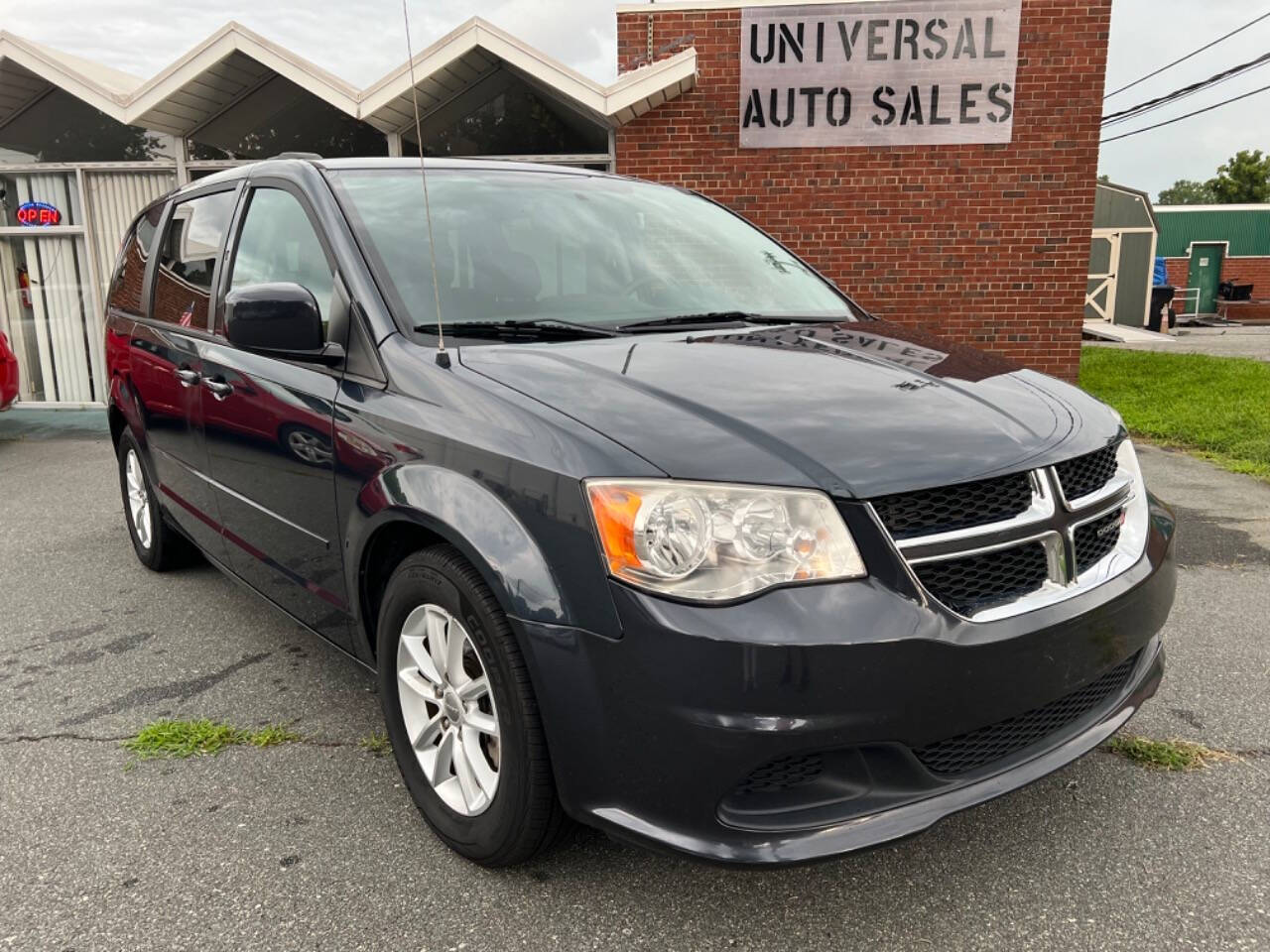 2013 Dodge Grand Caravan for sale at Universal Auto Sales LLC in Burlington, NC