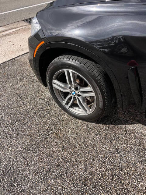 2019 BMW X6 for sale at M & J UNITED AUTO SALES in LAUDERDALE LAKES, FL