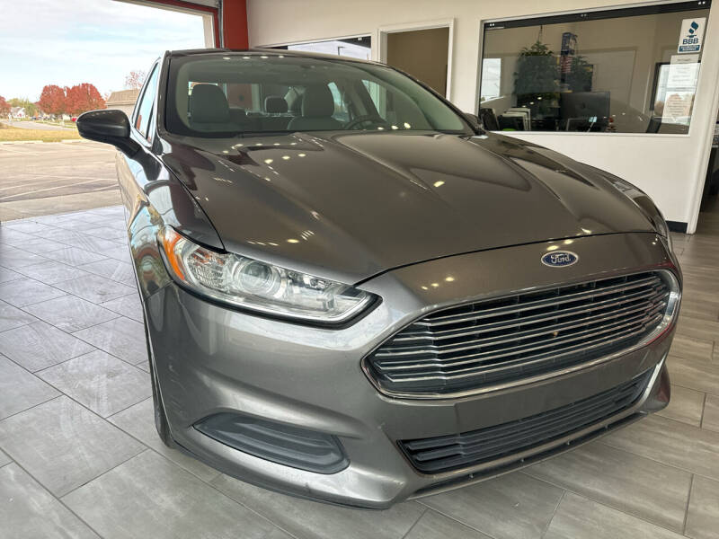 2014 Ford Fusion for sale at Evolution Autos in Whiteland IN